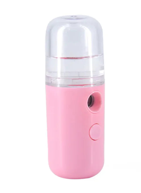 Pink and clear handheld device on a white background